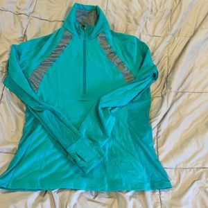 Lululemon Athletica long sleeve half zip. Beautiful color barely worn.